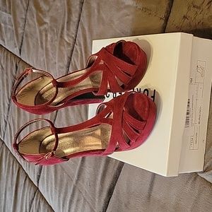 Burgundy suede-like Peep toe platforms.
